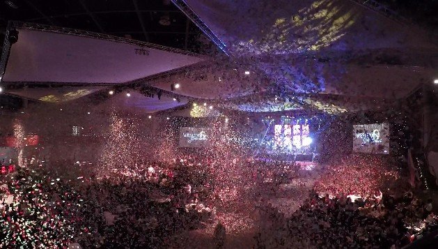 Massive blast of confetti fills the room